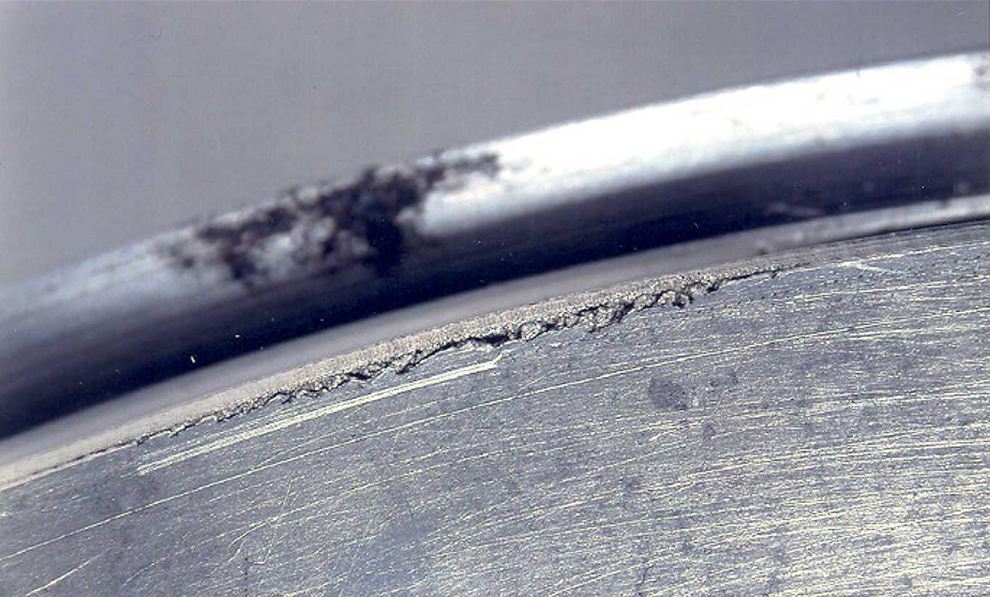 Cavitation erosion damage on a thrust bearing