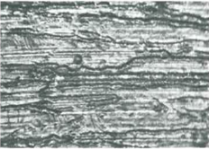 Scoring on a bearing surface